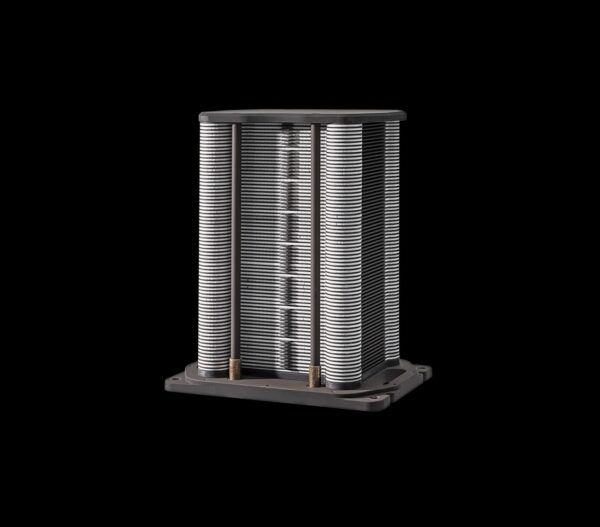 Solid-oxide stack with repeated cell layers held between end plates.